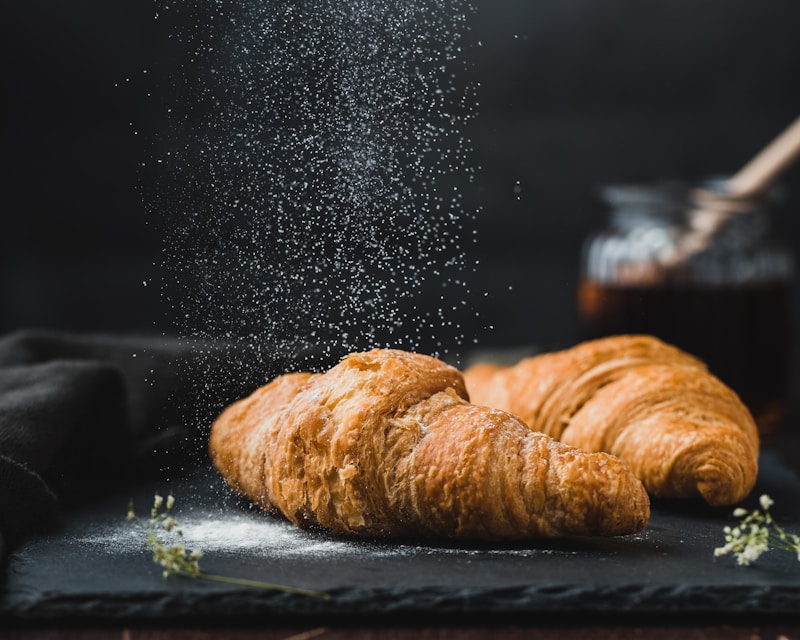 Flaky Almond Croissant dusted with sugar